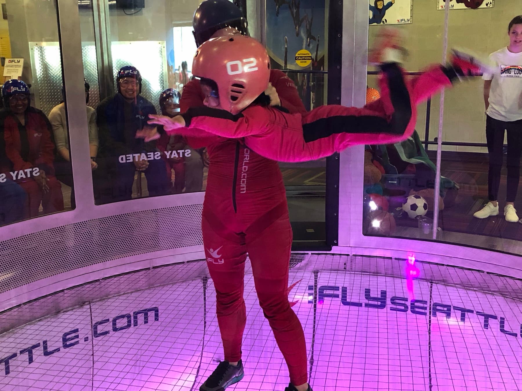 Students watching a classroom presentation on the large screen